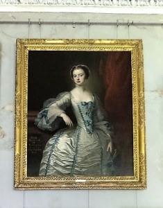 Portrait of a lady in a silver gown on display in  the Great Hall